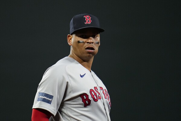 Rafael Devers lobbies Boston Red Sox front office for roster help | AP News