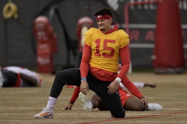 Kansas City Chiefs quarterbacks Patrick Mahomes (15) stretches during the team's NFL football practice Thursday, Feb. 1, 2024 in Kansas City, Mo. The Chiefs will play the San Francisco 49ers in Super Bowl 58. (AP Photo/Charlie Riedel)