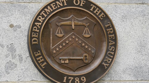 FILE - The Department of the Treasury's seal outside the Treasury Department building in Washington on May 4, 2021. The U.S. on Thursday, July 20, 2023, imposed sanctions on roughly 120 firms and people from Russia to the United Arab Emirates to Kyrgyzstan in an effort to choke off Moscow's access to products, money and financial channels that support its invasion of Ukraine. (AP Photo/Patrick Semansky, File)