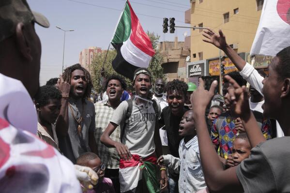 Sudanese anti-coup protesters take part in ongoing demonstrations against the military rule in Khartoum, Sudan, Monday, March.14, 2022. (AP Photo/Marwan Ali)