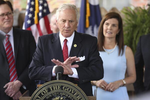 FILE - In this June 24, 2021, file photo, South Carolina Gov. Henry McMaster speaks during a ceremony to sign a bill preventing people from suing businesses over COVID-19 on Thursday, at Cafe Strudel in West Columbia, S.C.  McMaster is one of several Republican state leaders opposing federal efforts to go door-to-door to urge people to get vaccinated against COVID-19. (AP Photo/Jeffrey Collins, File)