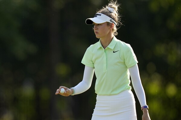 Nelly Korda acknowledges the crowd after her shot on the sixth green during the first round of the Chevron Championship LPGA golf tournament Thursday, April 18, 2024, at The Club at Carlton Woods, in The Woodlands, Texas. (AP Photo/Eric Gay)