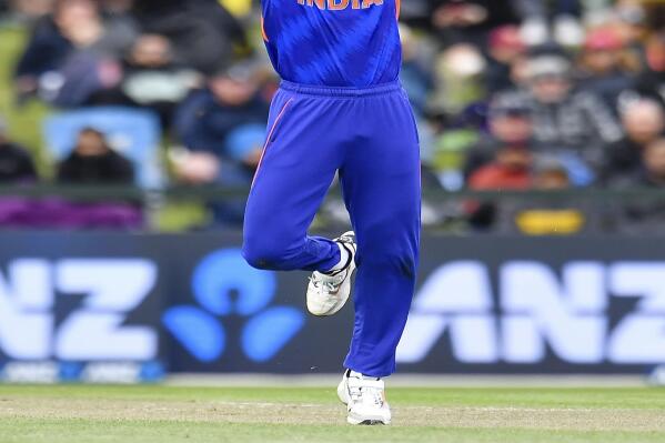 Arshdeep Singh of India fields the ball during the one day cricket international between India and New Zealand at Hagley Oval, in Christchurch, New Zealand, Wednesday, Nov. 30, 2022. (John Davidson /Photosport via AP)