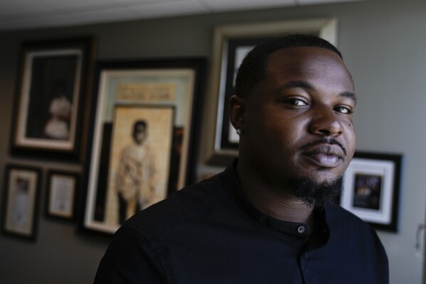 Randal Quran Reid poses for a portait at his attorney's office, Wednesday, Sept. 20, 2023, in Atlanta. Reid says the use of facial recognition technology by a sheriff's detective in Louisiana led to his arrest for crimes he did not commit. (AP Photo/John Bazemore)