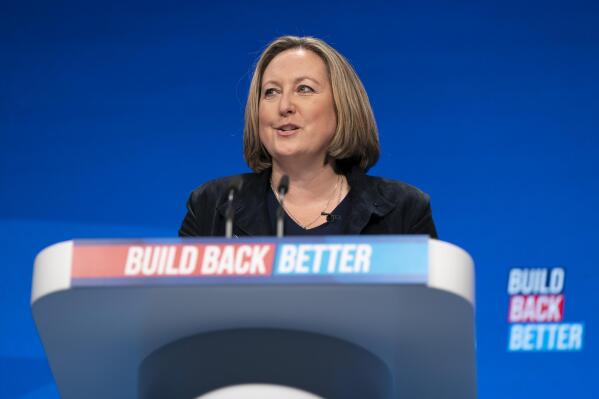 FILE- Anne-Marie Trevelyan Secretary of State for International Trade speaks at the Conservative Party Conference in Manchester, England, Sunday, Oct. 3, 2021. Trevelyan is in New Delhi and will meet with her Indian counterpart Piyush Goyal in New Delhi on Thursday, Jan. 13. India and Britain are launching talks on pursuing a free trade deal that is expected to boost bilateral trade by billions, making it among the most ambitious negotiations to take place after Brexit. (AP Photo/Jon Super, File)