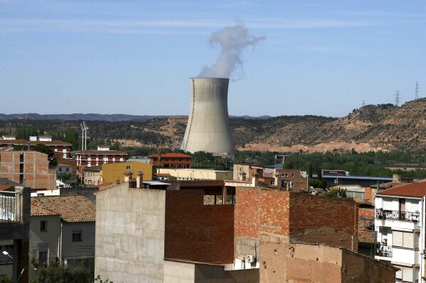 The Asco I nuclear power station, center, is seen near houses in the small town of Asco, Spain in Tuesday, April 15, 2008. (AP Photo/David Ramos, File)