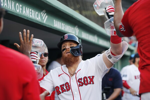 Boston Red Sox third baseman Rafael Devers celebrates his solo HR