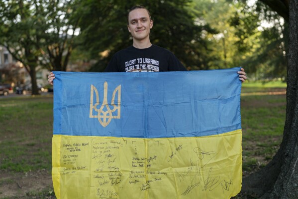 Vladyslav Plyaka poses for a photo at Capitol Hill neighborhood in Washington, Monday, June 2, 2025. (AP Photo/Jose Luis Magana)