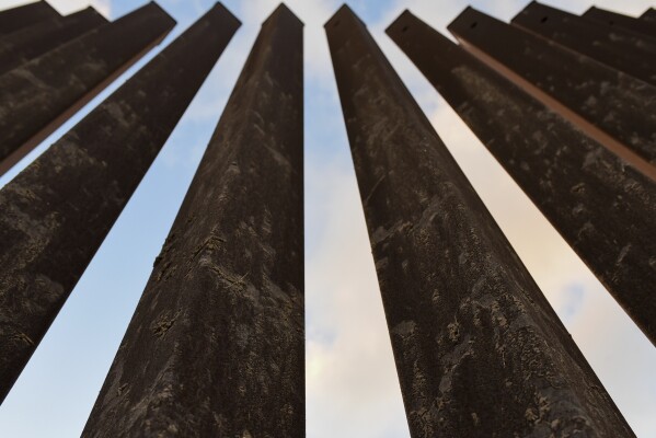 A section of border fence in Brownsville, Texas, on Wednesday, Nov. 8, 2023. The Biden administration's plan to build new barriers along the U.S.-Mexico border calls for a "movable" design that frustrates both environmentalists and advocates of stronger border enforcement. (AP Photo/Valerie Gonzalez)