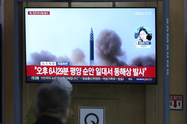 People watch a TV screen showing a news program reporting about North Korea's missile launch with file footage, at a train station in Seoul, South Korea, Thursday, May 12, 2022. South Korea says North Korea has fired a total of three short-range ballistic missiles toward the sea. South Korea's Joint Chiefs of Staff says the three missiles launched from the North's capital region on Thursday afternoon flew toward the waters off the country's eastern coast. (AP Photo/Lee Jin-man)