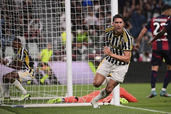 Juventus' Dusan Vlahovic, celebrates scoring a goal, during the Italian Serie A soccer match between Juventus and Bologna at the Allianz stadium in Turin, Italy, Sunday Aug. 27, 2023. (Marco Alpozzi/LaPresse via AP)