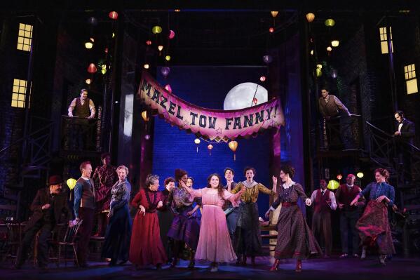 This image released by Polk & Co. shows Beanie Feldstein, center, with the cast during a performance of "Funny Girl." (Matthew Murphy/Polk & Co. via AP)