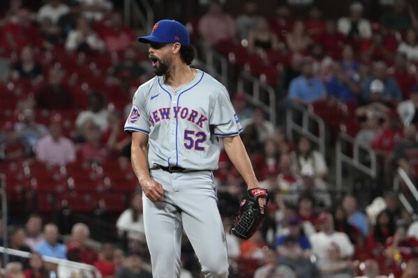 New York Mets relief pitcher Jorge Lopez reacts after striking out St. Louis Cardinals' Paul Goldschmidt with the bases loaded to end the seventh inning of a baseball game Tuesday, May 7, 2024, in St. Louis. (AP Photo/Jeff Roberson)