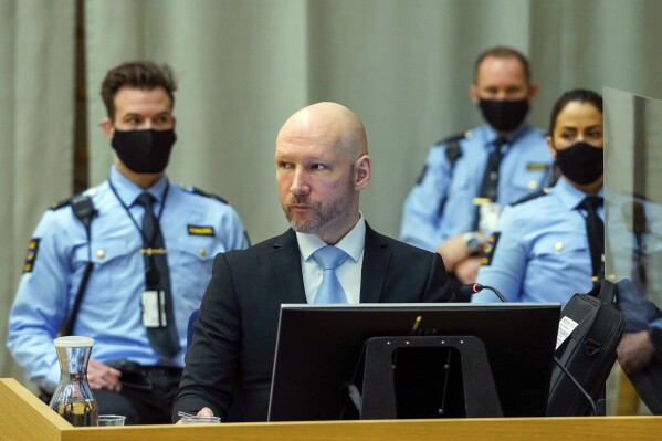FILE - Convicted mass murderer Anders Behring Breivik sits in the makeshift courtroom in Skien prison on the second day of his hearing where he is requesting release on parole, in Skien, Norway, Jan. 19, 2022. Breivik, the Norwegian right-wing extremist who killed 77 people in a bomb and gun rampage in 2011, will try for the second time Monday, Jan. 8, 2024 to sue the Norwegian state for allegedly breaching his human rights. (Ole Berg-Rusten/NTB scanpix via AP, File)