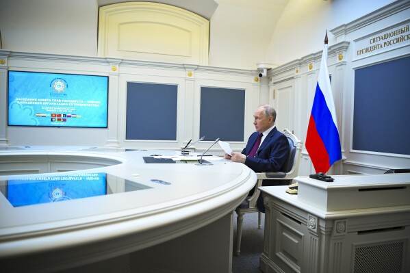 Russian President Vladimir Putin attends a meeting of the Shanghai Cooperation Organisation (SCO) Heads of State Council via videoconference at the Kremlin, in Moscow, Russia, Tuesday, July 4, 2023. (Alexander Kazakov, Sputnik, Kremlin Pool Photo via AP)