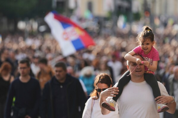 University students and people march during a protest, seven months after the deadly train station tragedy that sparked mass demonstrations against corruption in Belgrade, Serbia, Friday, May 30, 2025. (AP Photo/Darko Vojinovic)