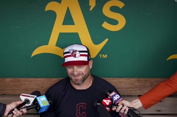 Cleveland Guardians manager Stephen Vogt speaks to reporters before the team's baseball game against the Oakland Athletics, Thursday, March 28, 2024, in Oakland, Calif. (AP Photo/Godofredo A. Vásquez)