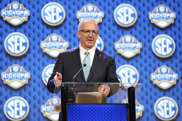 Southeastern Conference commissioner Greg Sankey speaks during SEC NCAA college football media days, July 15, 2024, in Dallas. (AP Photo/Jeffrey McWhorter, File)