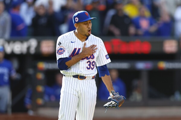New York Mets pitcher Edwin Díaz (39) reacts after the New York Mets defeated the Kansas City Royals, Sunday, April 14, 2024, in New York. (AP Photo/Noah K. Murray)