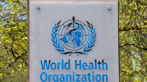 The logo and building of the World Health Organization (WHO) headquarters in Geneva, Switzerland, 15 April 2020. US President Donald Trump announced that he has instructed his administration to halt funding to the WHO. The American president criticizes the World Health Organization for its mismanagement of the Coronavirus pandemic Covid-19. (Martial Trezzini/Keystone via AP)