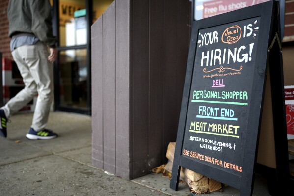 A hiring sign is displayed at a grocery store in Glenview, Ill., Monday, Nov. 25, 2024. (AP Photo/Nam Y. Huh, File)