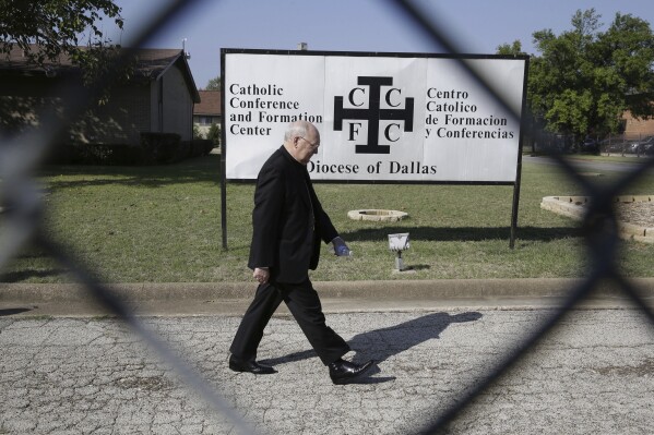 Catholic Bishop Kevin Farrell walks to speak to media outside the the Diocese of Dallas Catholic Conference and Formation Center on Oct. 20, 2014. (AP Photo/LM Otero, File)