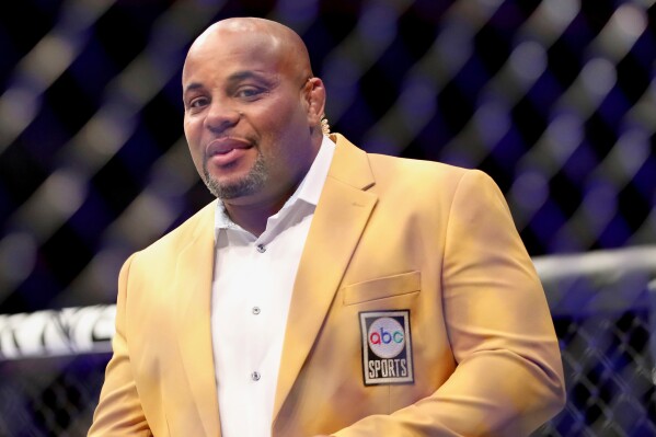 UFC Hall of Famer Daniel Cormier is seen in the ring at UFC on ABC 3, Saturday, July 16, 2022, in Elmont, N.Y. (AP Photo/Gregory Payan, File)