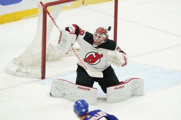 New Jersey Devils goaltender Mackenzie Blackwood (29) stops a shot on goal during the second period of an NHL hockey game against the New York Islanders Saturday, May 8, 2021, in Uniondale, N.Y. (AP Photo/Frank Franklin II)