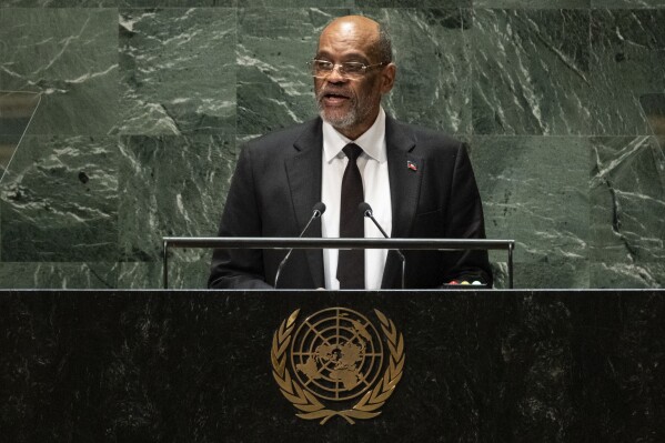 FILE - Prime Minister of Haiti Ariel Henry addresses the 78th session of the United Nations General Assembly, on Sept. 22, 2023, at United Nations headquarters. Haiti’s prime minister has arrived in Kenya to try to salvage a plan to have the African country deploy 1,000 police officers to the troubled Caribbean nation to help combat gang violence.Kenya agreed in October to lead a U.N.-authorized international police force to Haiti. (AP Photo/Craig Ruttle, File)