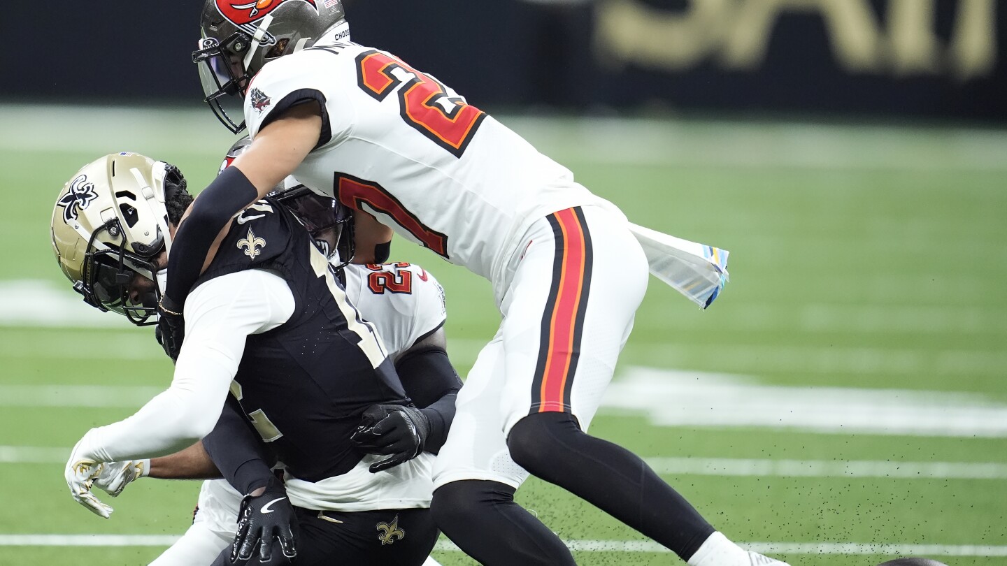 Saints receiver Chris Olave was sidelined against Tampa Bay due to an illegal helmet-to-helmet hit