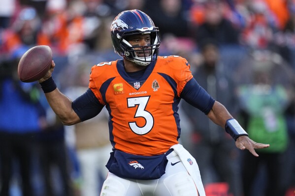 Denver Broncos quarterback Russell Wilson (3) throws during the first half of an NFL football game against the Cleveland Browns on Sunday, Nov. 26, 2023, in Denver. (AP Photo/Jack Dempsey)