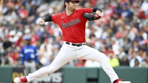 Cleveland Guardians starting pitcher Gavin Williams delivers during the first inning of a baseball game against the Kansas City Royals, Saturday, July 8, 2023, in Cleveland. (AP Photo/Nick Cammett)