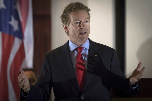 
              In this Aug. 11, 2017 photo, Sen. Rand Paul, R-Ky., speaks to supporters in Hebron, Ky. A man has been arrested and charged with assaulting and injuring Rand Paul. Kentucky State Police said in a news release Saturday, Nov. 4, 2017 that Paul suffered a minor injury when 59-year-old Rene Boucher assaulted him at his Warren County home on Friday afternoon. The release did not provide details of the assault or the nature of Paul's injury. In a statement, Paul spokeswoman Kelsey Cooper said the Republican senator was "fine." (AP Photo/Bryan Woolston, file)
            