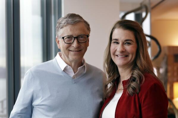 FILE - In this Feb. 1, 2019, file photo, Bill Gates and Melinda French Gates pose together in Kirkland, Wash. A handful of Americans donated at least $1 billion to charity last year, according to the Chronicle of Philanthropy’s annual ranking of the 50 Americans who gave the most to charity in 2021. Bill Gates and Melinda French Gates topped the list, pledging $15 billion to the Bill & Melinda Gates Foundation, a huge player in global health and American education.  (AP Photo/Elaine Thompson, File)