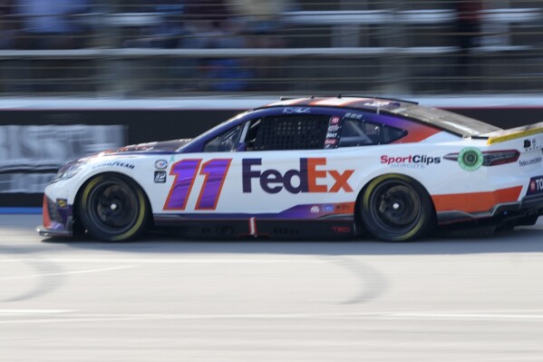 Denny Hamlin competes in a NASCAR Cup Series auto race at Texas Motor Speedway in Fort Worth, Texas, Sunday, Sept. 24, 2023. (AP Photo/LM Otero)