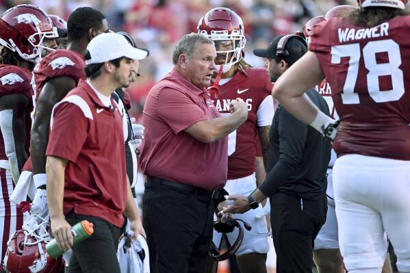 Arkansas coach Sam Pittman talks to his team during a time out against Missouri State during the first half of an NCAA college football game Saturday, Sept. 17, 2022, in Fayetteville, Ark. (AP Photo/Michael Woods)