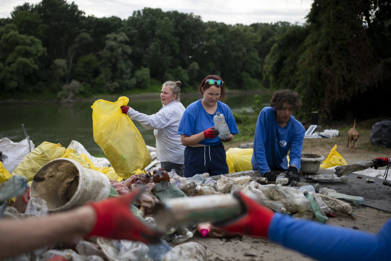 Volunteers head off plastic waste crisis by removing tons of rubbish from Hungarian river