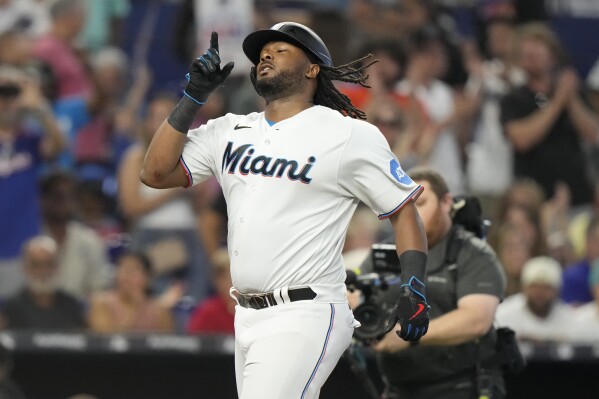 Miami Marlins' Josh Bell runs the bases after hitting a solo home run during the third inning of a baseball game against the Milwaukee Brewers, Sunday, Sept. 24, 2023, in Miami. (AP Photo/Lynne Sladky)