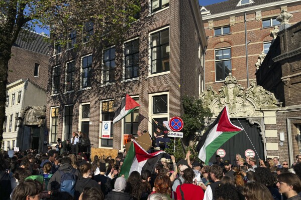 Students gather for a pro-Palestinian protest at the University of Amsterdam, Netherlands, Tuesday, May 7, 2024. Earlier on Tuesday, Dutch police broke up a pro-Palestinian demonstration camp at the University of Amsterdam. Police spokeswoman Sara Tillart said about 140 protesters were arrested, two of whom remain in custody on suspicion of committing public violence. (AP Photo/Aleksandar Furtula)