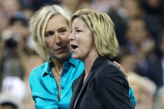 FILE - Former tennis players Martina Navratilova, left, and Chris Evert are introduced before the start of the women's championship match at the U.S. Open tennis tournament in New York, Saturday, Sept. 11, 2010. Hall of Famers Chris Evert and Martina Navratilova are calling on the women's tennis tour to stay out of Saudi Arabia, saying that holding the WTA Finals there “would represent not progress, but significant regression.” (AP Photo/Charles Krupa, File)
