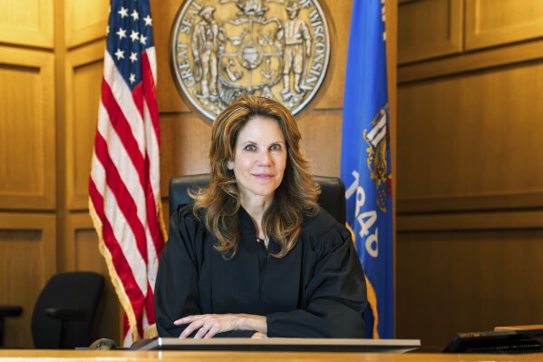 This May 2025 photo provided by the Chris Taylor for Justice campaign shows Wisconsin Appeals Court Judge Chris Taylor inside a courtroom of the Dane County Courthouse in Madison, Wis. (Nicole Merchut/Chris Taylor for Justice via AP)