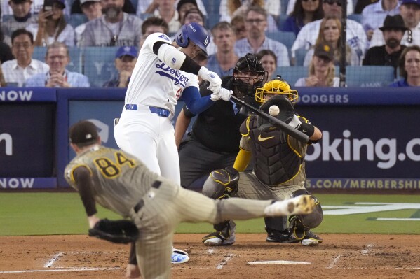 Ohtani homers in playoff debut and the Dodgers rally to beat the Padres 7-5  in NLDS opener | AP News