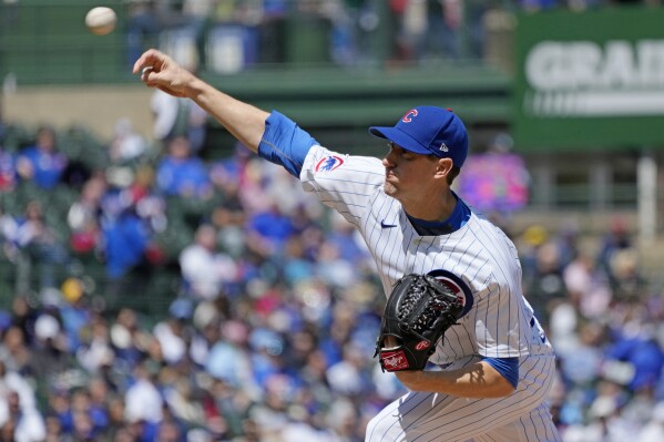 Chicago Cubs starting pitcher Kyle Hendricks throws against the Miami Marlins during the first inning of a baseball game in Chicago, Sunday, April 21, 2024. (AP Photo/Nam Y. Huh)