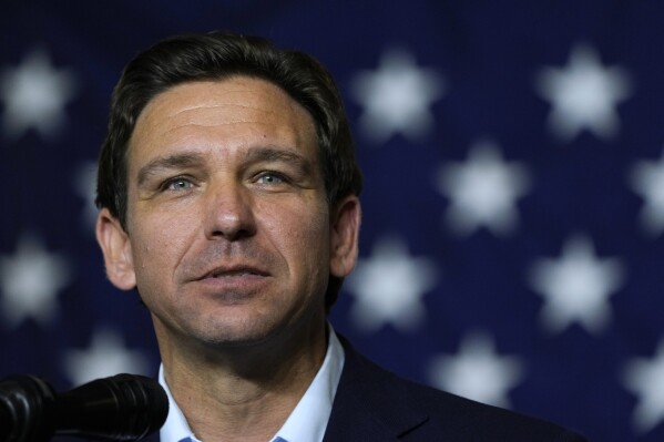 FILE - Republican presidential candidate Florida Gov. Ron DeSantis speaks during a fundraising event for U.S. Rep. Ashley Hinson, R-Iowa, Aug. 6, 2023, in Cedar Rapids, Iowa. The Florida governor is bringing on James Uthmeier, his chief of staff from his state office, to serve as his campaign manager, replacing Generra Peck, who led DeSantis' reelection campaign last year before jumping into the same role on his presidential bid. (AP Photo/Charlie Neibergall)