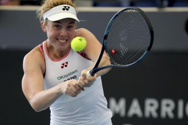 Czech Republic's Linda Noskova makes a backhand return to Belarus' Aryna Sabalenka during the final of the Adelaide International Tennis tournament in Adelaide, Australia, Sunday, Jan. 8, 2023. (AP Photo/Kelly Barnes)