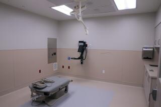 FILE - A surgical procedure room is photographed on Oct. 2, 2019, in the new Fairview Heights, Ill., Planned Parenthood facility. A Missouri legislative proposal shows that anti-abortion lawmakers in Republican-led states aren't likely to stop at banning most abortions within their borders. St. Louis-area Republican and state Rep. Mary Elizabeth Coleman wants to make it illegal to "aid or abet" abortions that violate Missouri law, even if they are performed in other states. (Christian Gooden/St. Louis Post-Dispatch via AP, File)