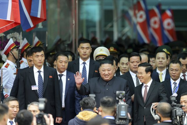 
              North Korean leader Kim Jong Un waves upon arrival by train in Dong Dang in Vietnamese border town Tuesday, Feb. 26, 2019, ahead of his second summit with U.S. President Donald Trump. (AP Photo/Minh Hoang)
            