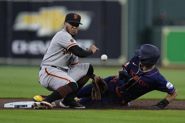 Houston Astros shortstop Mauricio Dubon steals second base in the