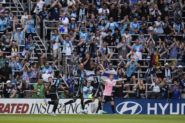 Minnesota United defender Anthony Markanich (13) celebrates after scoring during the first half of an MLS soccer match against Inter Miami, Saturday, May 10, 2025, in St. Paul, Minn. (AP Photo/Abbie Parr)