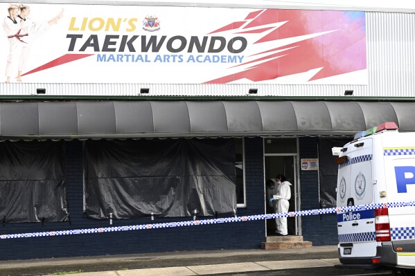 Police investigate at a crime scene in Sydney, Wednesday, Feb. 21, 2024. A taekwondo instructor killed a 7-year-old student at his academy and the boy's parents before going to a Sydney hospital with stab and slash wounds on his body, police said Wednesday. (Dan Himbrechts/AAPImage via 番茄直播)